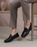 Frison Noir Cuir